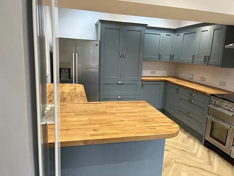 Single-storey kitchen extension with bi-fold doors in Bletchley